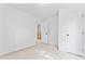Neutral bedroom featuring access to the hallway and closets, providing functionality and a clean slate at 9833 White Cascade Dr, Charlotte, NC 28269