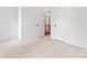 Bedroom with neutral carpet and doors to hallway and closet, offering a bright and clean space at 9833 White Cascade Dr, Charlotte, NC 28269
