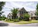 Beautiful two-story home with manicured landscaping, a double porch and shutters at 10818 Alvarado Way, Charlotte, NC 28277