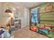 Stylish bedroom featuring a wooden frame bed, fun decor, and ample storage at 113 Missouri Ln, Mount Holly, NC 28120