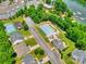 Aerial view of community pool, tennis courts, and marina at 113 Missouri Ln, Mount Holly, NC 28120