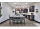 Well-lit kitchen featuring stainless steel appliances and an island with pendant lighting at 113 Missouri Ln, Mount Holly, NC 28120