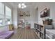 Playroom with natural light, includes shelving, a TV and other storage and decor at 113 Missouri Ln, Mount Holly, NC 28120