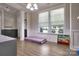 Bright room with ample natural light and modern flooring, perfect for a playroom at 113 Missouri Ln, Mount Holly, NC 28120