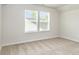 This bedroom features a bright window and neutral walls, creating a serene atmosphere at 1205 Cathey Rd, Charlotte, NC 28214