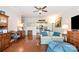 Open-concept living room with wood floors at 1300 Reece Rd # 402, Charlotte, NC 28209