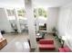An overhead view showcases the expansive lobby with seating, a reception desk, and floor-to-ceiling windows at 1300 Reece Rd # 402, Charlotte, NC 28209