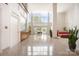 Bright lobby with high ceilings, large windows, and a reception desk, creating a welcoming entrance at 1300 Reece Rd # 402, Charlotte, NC 28209