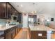 Spacious kitchen with granite countertops and stainless steel appliances at 133 Glade Valley Ave, Mooresville, NC 28117