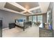 Bedroom boasts decorative ceiling, black furniture, carpet, and plenty of natural light at 133 Glade Valley Ave, Mooresville, NC 28117