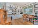Well-lit home office with built-in bookshelves and a desk area at 133 Glade Valley Ave, Mooresville, NC 28117