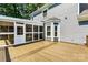 Backyard featuring wooden deck and screened-in porch provides outdoor space at 1581 Bluff Ct, Rock Hill, SC 29732