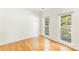 Bedroom featuring hardwood floors and lots of natural light from two windows at 1581 Bluff Ct, Rock Hill, SC 29732