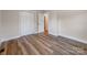 A bedroom offering wood floors, closet and neutral walls creating a comfortable living space at 1606 N Rhyne St, Gastonia, NC 28054
