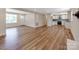 Open layout showcases new floors and seamless flow to the modern kitchen at 1606 N Rhyne St, Gastonia, NC 28054