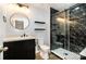 Modern bathroom featuring a stand-up shower with black and white tile at 172 Briana Marie Way, Indian Trail, NC 28079