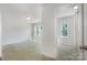 Bright bedroom with a doorway and windows at 172 Briana Marie Way, Indian Trail, NC 28079