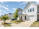 Stylish townhomes with attached garages and manicured lawns at 172 Briana Marie Way, Indian Trail, NC 28079