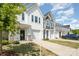 Charming townhomes showcasing well-manicured lawns and inviting entrances at 172 Briana Marie Way, Indian Trail, NC 28079