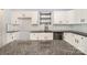 Modern kitchen with granite countertops, white cabinets, subway tile backsplash, and stainless steel appliances at 172 Briana Marie Way, Indian Trail, NC 28079