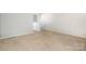 Spacious loft area with neutral carpet and bright, airy feel at 172 Briana Marie Way, Indian Trail, NC 28079