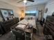 View of bedroom with a decorative bed, dresser, and an office setup at 1723 Lowder St, Albemarle, NC 28001
