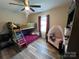 View of a bedroom featuring bunk beds and a playpen at 1723 Lowder St, Albemarle, NC 28001