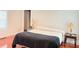 Inviting bedroom with a comfortable bed, wooden floors, and soft lighting from bedside lamps at 210 W Church St, Cherryville, NC 28021