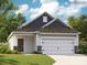 Charming single-story home featuring a two-car garage, a cozy front porch, and classic architectural details at 225 Runner Stone Ln, Fort Mill, SC 29715
