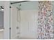 Bathroom featuring a shower-tub combo with a floral curtain at 2268 Bay Ct, Newton, NC 28658