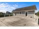View of the exterior featuring a spacious deck area with doors that lead into the house at 2268 Bay Ct, Newton, NC 28658