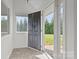 Inviting foyer with tiled flooring, a window with views of the outside, and natural light at 2268 Bay Ct, Newton, NC 28658