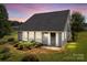Charming single-story home with large windows, well-kept lawn, and mature landscaping at 2268 Bay Ct, Newton, NC 28658