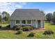 Inviting single-story home with ample natural light, a well-manicured lawn, and mature shrubs at 2268 Bay Ct, Newton, NC 28658