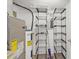 Utility room with shelving, a water heater and an electrical panel for home systems at 2268 Bay Ct, Newton, NC 28658