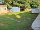 Backyard featuring two storage sheds and a partial view of a deck at 2289 Kestrel Dr, Rock Hill, SC 29732