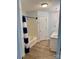 Light and bright bathroom showcases a tub-shower combo and double sink vanity at 2289 Kestrel Dr, Rock Hill, SC 29732