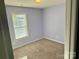 Cozy bedroom with soft carpet, natural light, and neutral color palette at 2289 Kestrel Dr, Rock Hill, SC 29732