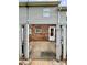 Backyard patio area with brick and vinyl siding and a wooden fence at 250 Nixon Rd # 41, Belmont, NC 28012