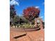 Picturesque city park featuring a memorial fountain, mature trees, and American flags, offering a peaceful retreat at 250 Nixon Rd # 41, Belmont, NC 28012