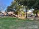 Lush community park with mature trees, playground equipment, and green space for outdoor activities at 250 Nixon Rd # 41, Belmont, NC 28012