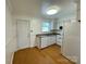 Functional kitchen features tile floors, white cabinets, and essential appliances at 250 Nixon Rd # 41, Belmont, NC 28012