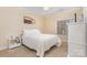 Bright bedroom featuring a neutral color palette and comfortable queen-size bed at 2773 Clover Nw Rd, Concord, NC 28027