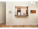 Interior view featuring a pass-through to the kitchen, hardwood floors, and neutral paint colors at 2773 Clover Nw Rd, Concord, NC 28027