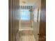 This bathroom features a tub/shower combo and patterned wallpaper at 3009 Grier St, Newton, NC 28658