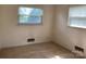 Bedroom with two windows offering lots of natural light at 3009 Grier St, Newton, NC 28658