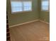 This carpeted bedroom features bright natural light from the window and neutral decor at 3009 Grier St, Newton, NC 28658