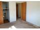 Bedroom features a closet and view into additional rooms at 3009 Grier St, Newton, NC 28658