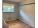 This bedroom offers a sunny window and neutral walls, creating a peaceful retreat at 3009 Grier St, Newton, NC 28658
