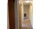 This hallway features neutral colored walls and carpets, as well as white trim around the doorways at 3009 Grier St, Newton, NC 28658